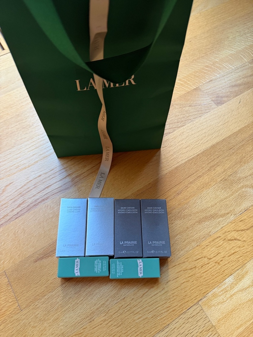 La Mer Green and Teal Mini Boxes with La Prairie Silver Packaging